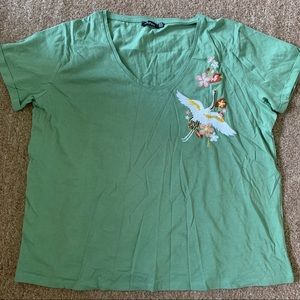 Women’s green tee shirt